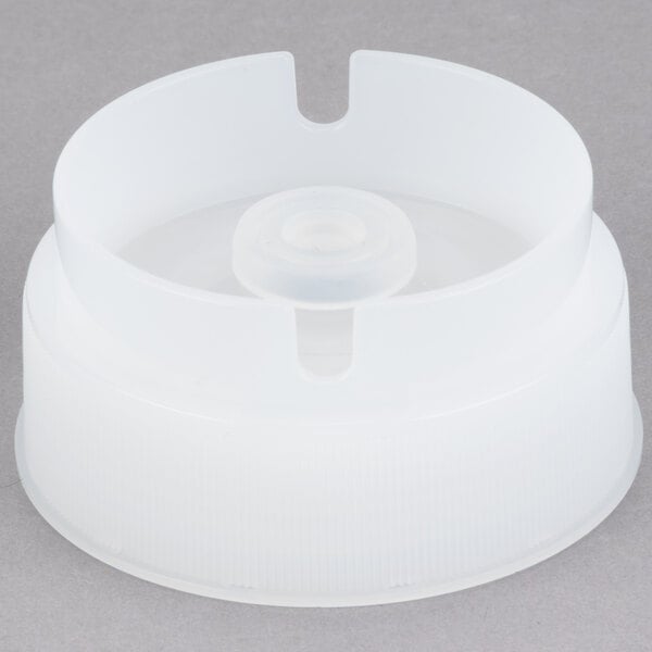 A white plastic Tablecraft cap with a circular hole in it.