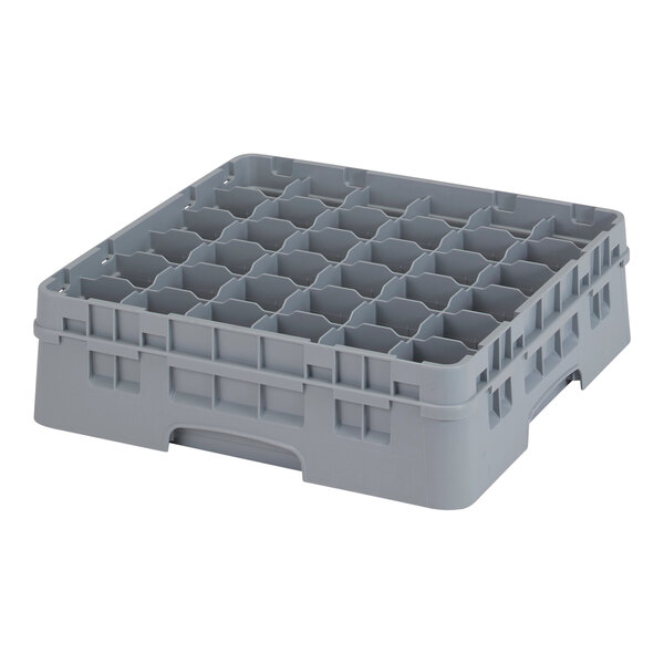 A gray plastic container with many compartments.
