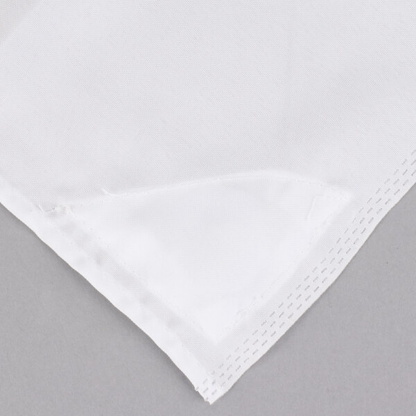 A white Hookless shower curtain with a translucent window and weighted corner magnets.