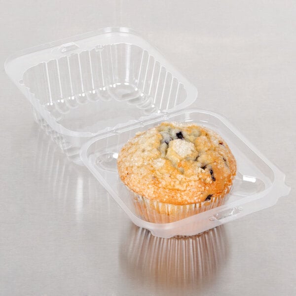 A muffin in a Polar Pak plastic container.