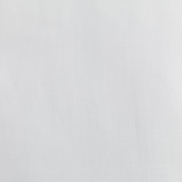 A close-up of a white textured fabric with small dots.