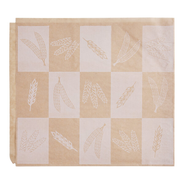 A natural kraft paper liner or deli wrap with an artisan print featuring various wheat and grain illustrations, measuring 9 by 10 inches.
