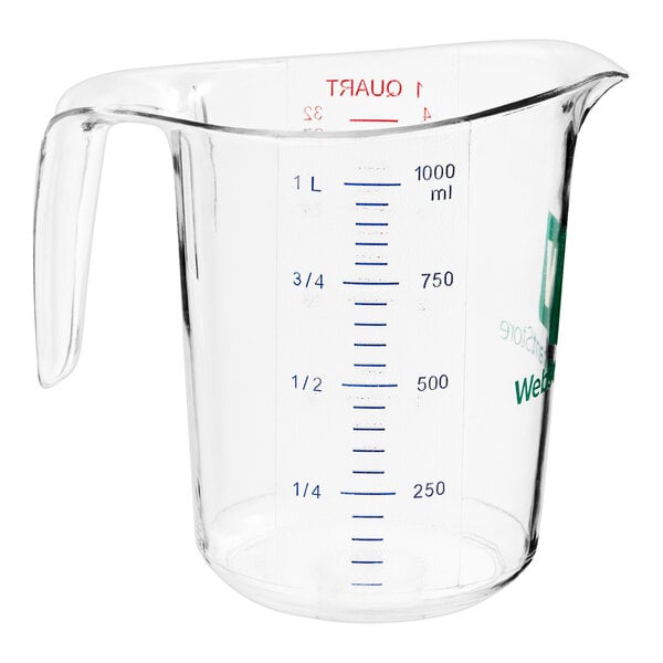 A WebstaurantStore clear plastic measuring cup with a handle and measuring line.