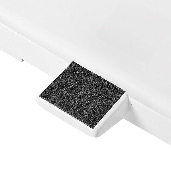 A close up of a white Rubbermaid medical step can.