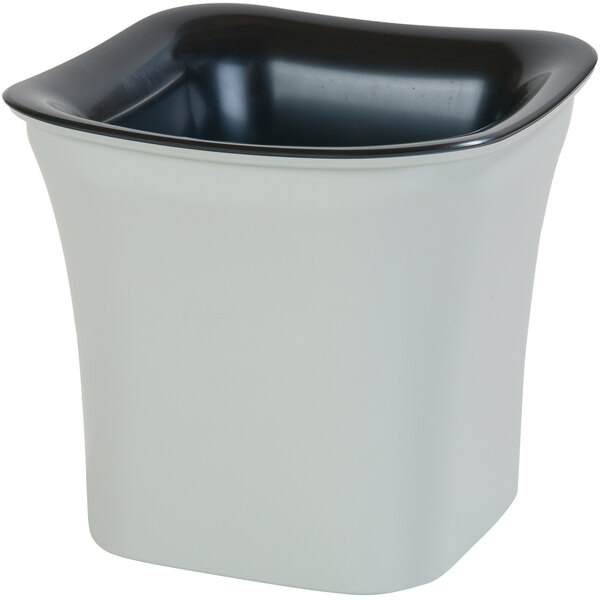 A black and white square Carlisle Coldmaster crock.