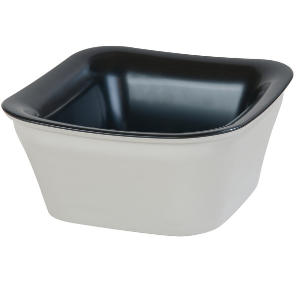A black and white square Carlisle Coldmaster crock.