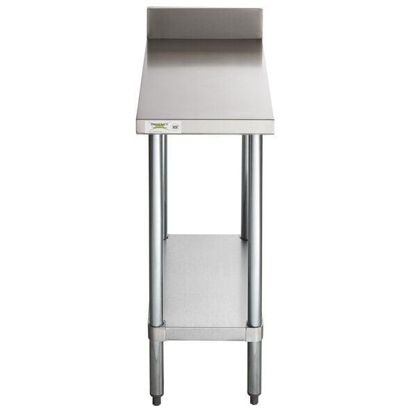 A Regency stainless steel equipment filler table with a galvanized undershelf.