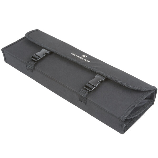 A black roll up case with straps.