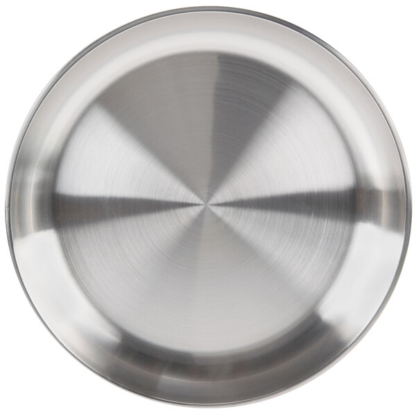 A close-up of a stainless steel American Metalcraft seafood tray with a circular design.