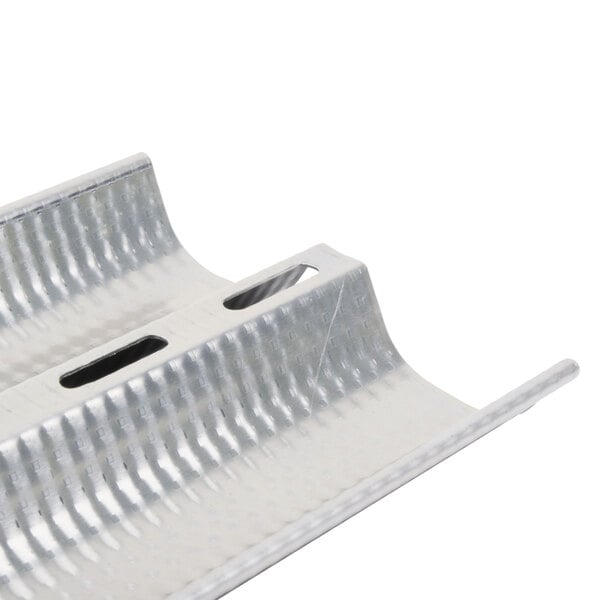 A close-up of a Matfer Bourgeat baguette pan with metal strips and holes.
