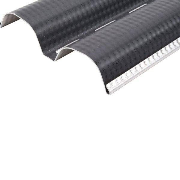 A close-up of a black metal Matfer Bourgeat baguette pan with silver stripes.