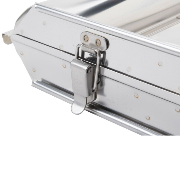 A close-up of a Matfer Bourgeat stainless steel triple round bread mold.