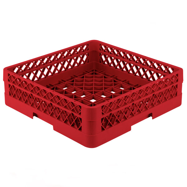A red plastic dish rack with lattice design and holes.