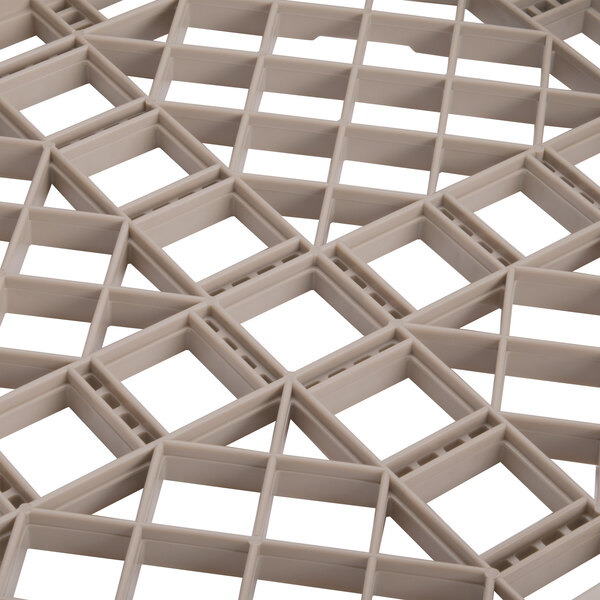 A beige plastic grid rack with squares.