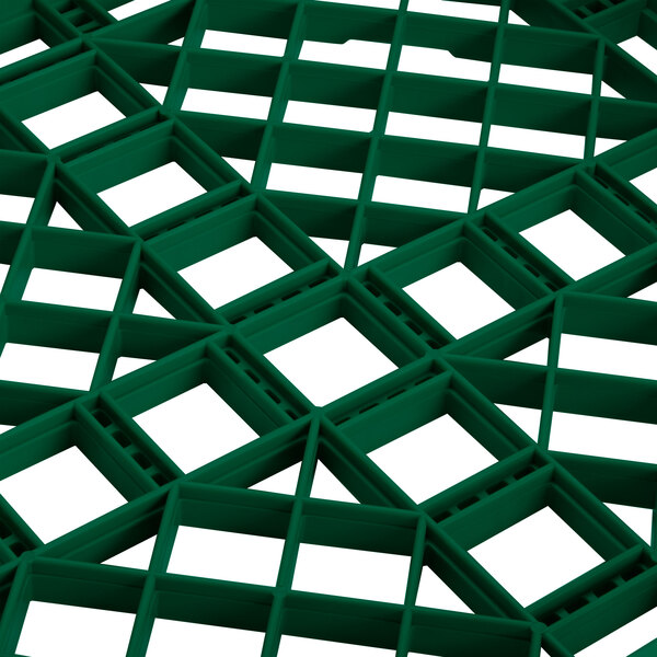 A Vollrath Traex green plastic dish rack grid with holes.