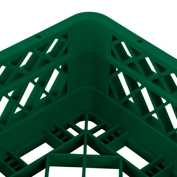 A Vollrath TR1A Traex green plastic dish rack with handle and holes.