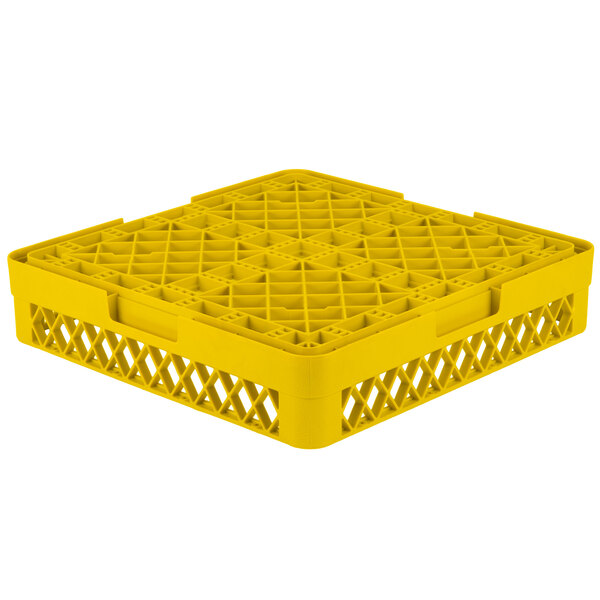 A yellow plastic Vollrath Traex rack with four holes.