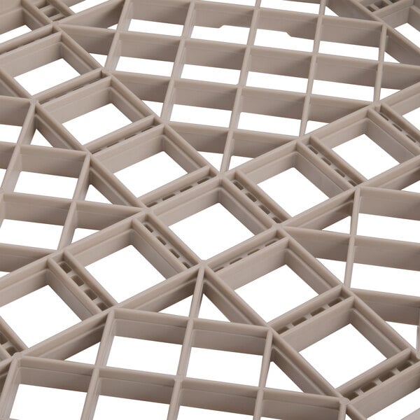 A beige plastic grid for Vollrath TR1A dish rack.