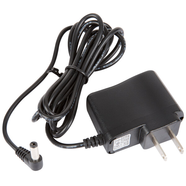 A close-up of a black power cord with a plug.