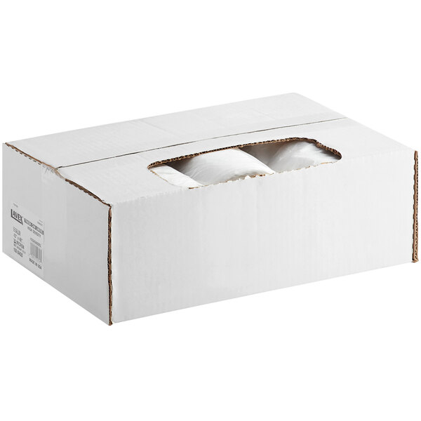 A white box with rolls of Lavex janitorial can liners inside.
