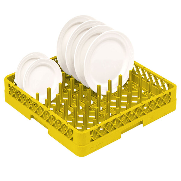 A Vollrath yellow plastic dish rack with white plates on it.