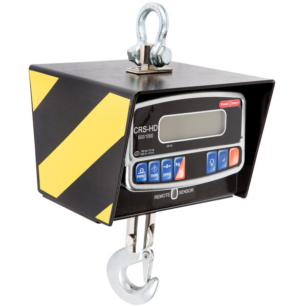 A close-up of a black and yellow Tor Rey digital crane scale with a hook.