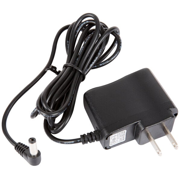 A close-up of a black power cord with a plug.