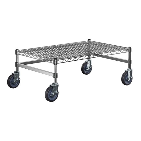 A chrome plated metal Regency dunnage rack with black wheels.