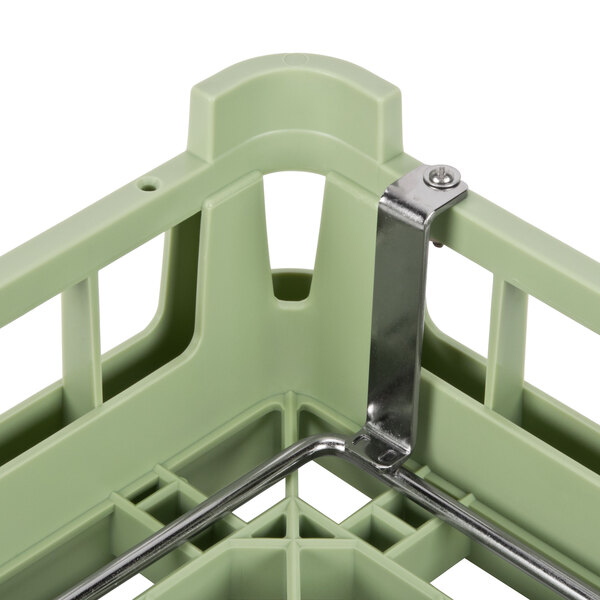 A light green Vollrath plastic tray rack.