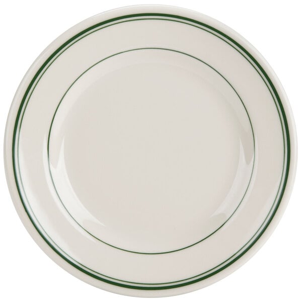 A white plate with green bands on the edge.