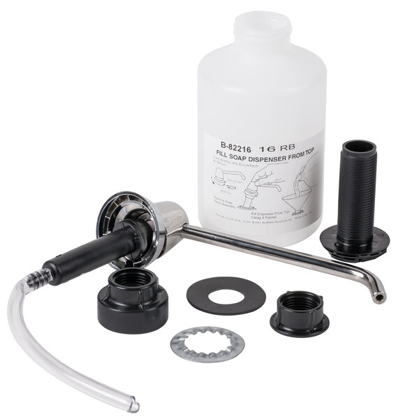 A Bobrick deck mounted liquid soap dispenser with a plastic container inside.