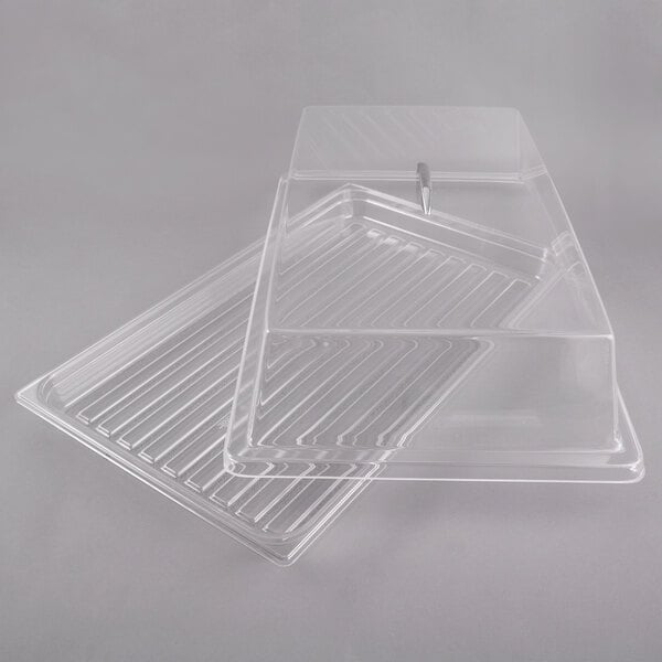 A clear polycarbonate tray with an acrylic rectangular cover.