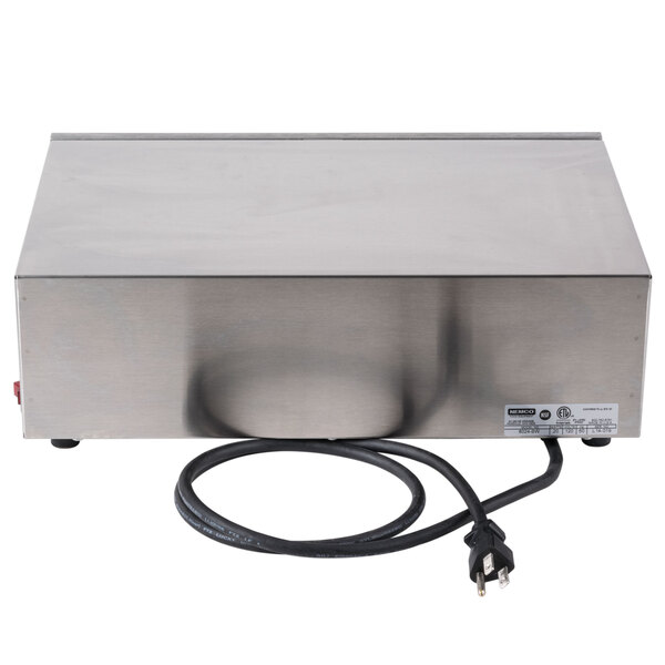 A stainless steel Nemco Hot Dog Bun Warmer with an electric cord on a counter.