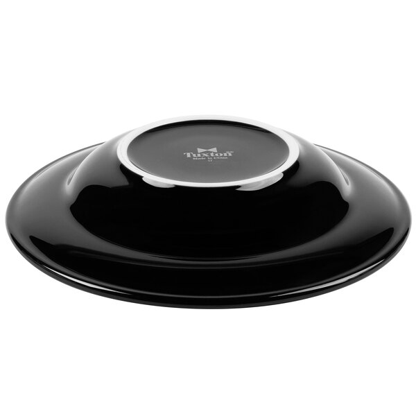 A black bowl with a white rim.
