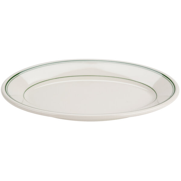 A white oval platter with a green band on the rim.