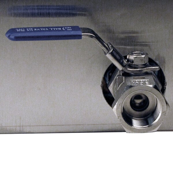 A close-up of the stainless steel ball valve with a blue handle on a Paragon Mighty Corn Dog Fryer.