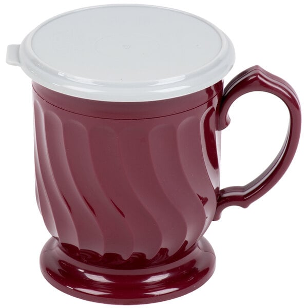 A red Dinex Turnbury mug with a white lid.