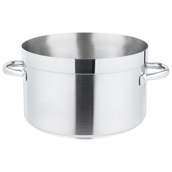 A close-up of a large silver Vollrath sauce pot with handles.