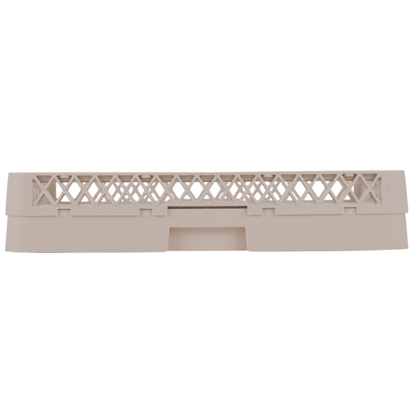 A beige plastic rack with extenders and a lattice pattern.