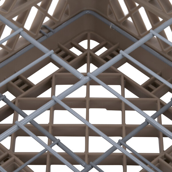 A beige plastic Vollrath Traex plate rack with metal bars.