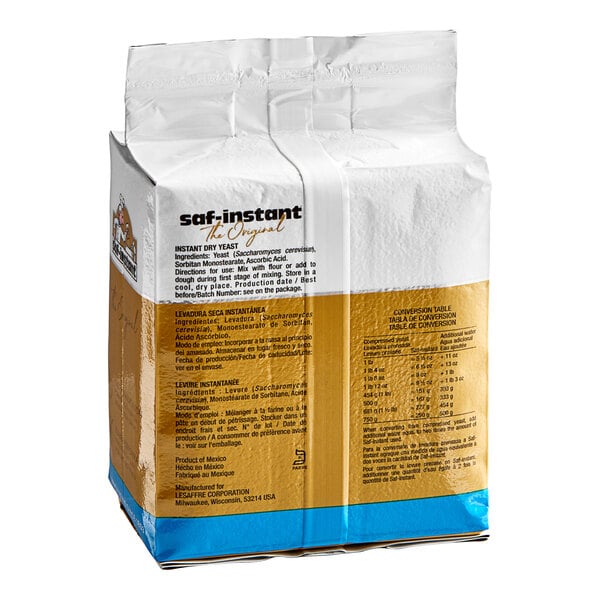 A white and gold vacuum pack of Lesaffre SAF-Instant Yeast with black text.