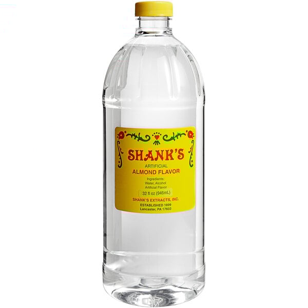 A bottle of Shank's Imitation Almond Extract with a white label.