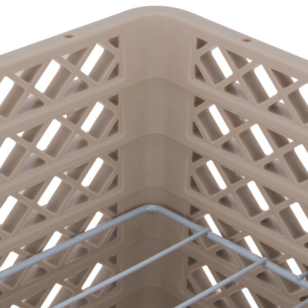 A beige Vollrath Traex Plate Crate with 12 compartments for plates.