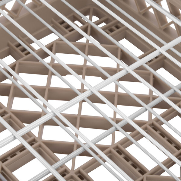 A beige plastic Vollrath Traex Plate Crate with wire mesh compartments.