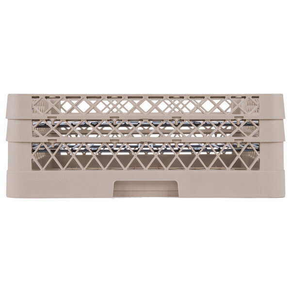 A beige Vollrath Traex Plate Crate with 48 compartments.