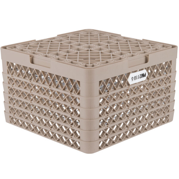 A beige plastic Vollrath Traex Plate Crate with holes.