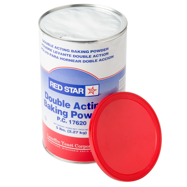 A red canister of Double Acting Baking Powder on a counter.
