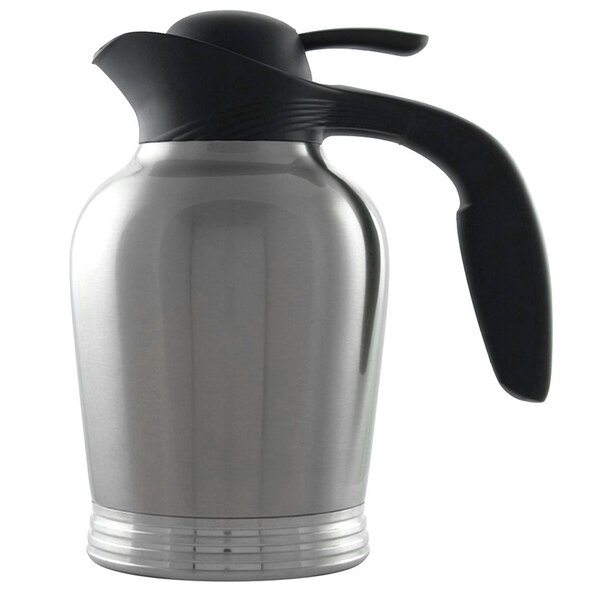 A Stanley stainless steel coffee server with a black handle.