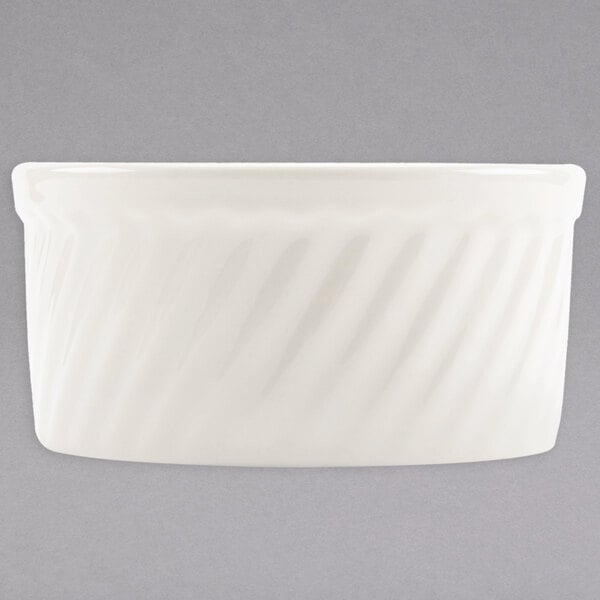 A Hall China ivory swirl souffle dish.