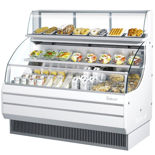 A white Turbo Air top dry display case with food on it.